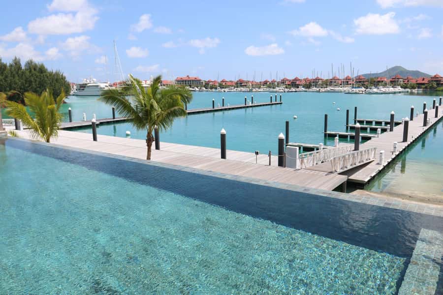 From Mahé: Seychelles Sunset Cruise with Hotel Transfers - Coastal views along northern Mahé